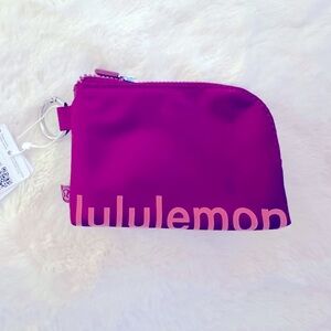 Lululemon Clippable Card Pouch NWT, red, pink with silver hardware.